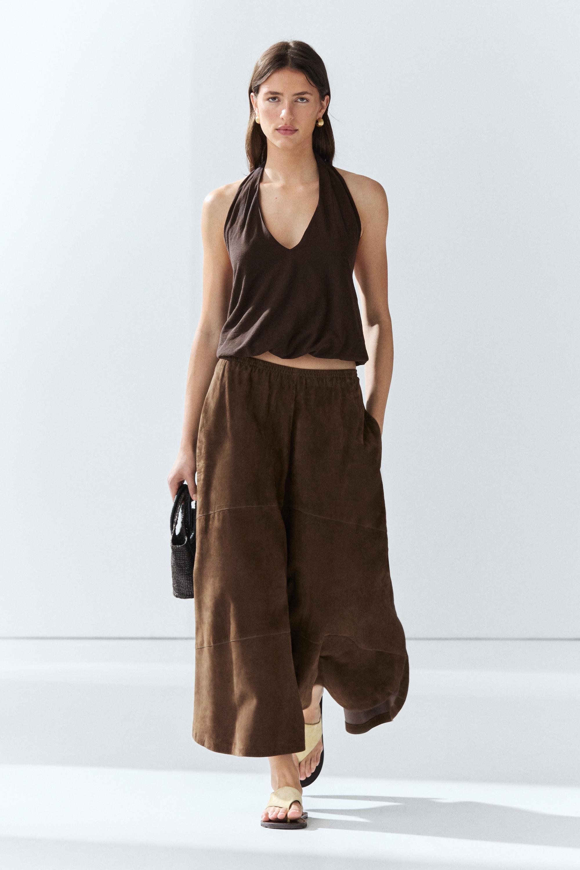 Jupe midi en cuir effet daim